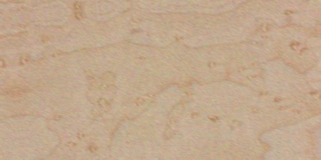 Birdseye maple — This image shows birdseye maple (Acer saccharum), which is characterized by tiny knots in the grain resembling small bird's eyes, a growth anomaly caused by unfavorable conditions. | https://www.wood-database.com/wp-content/uploads/acer-spp-birdseye-225x450.jpg